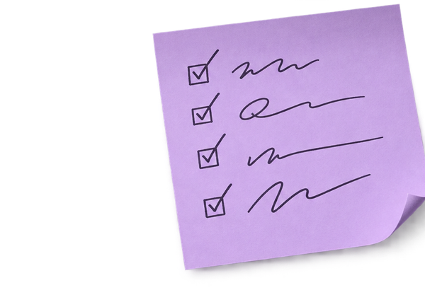 A scribbled lavender sticky note